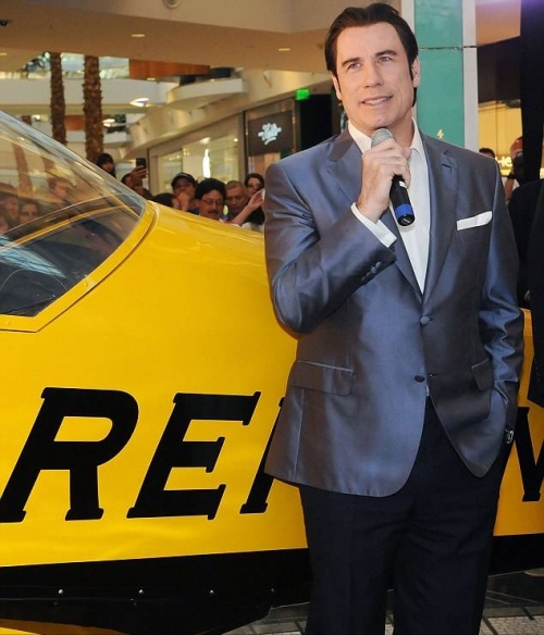 Джон Траволта на открытии магазина Breitling